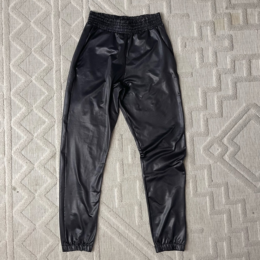 Black faux leather jogger pants
